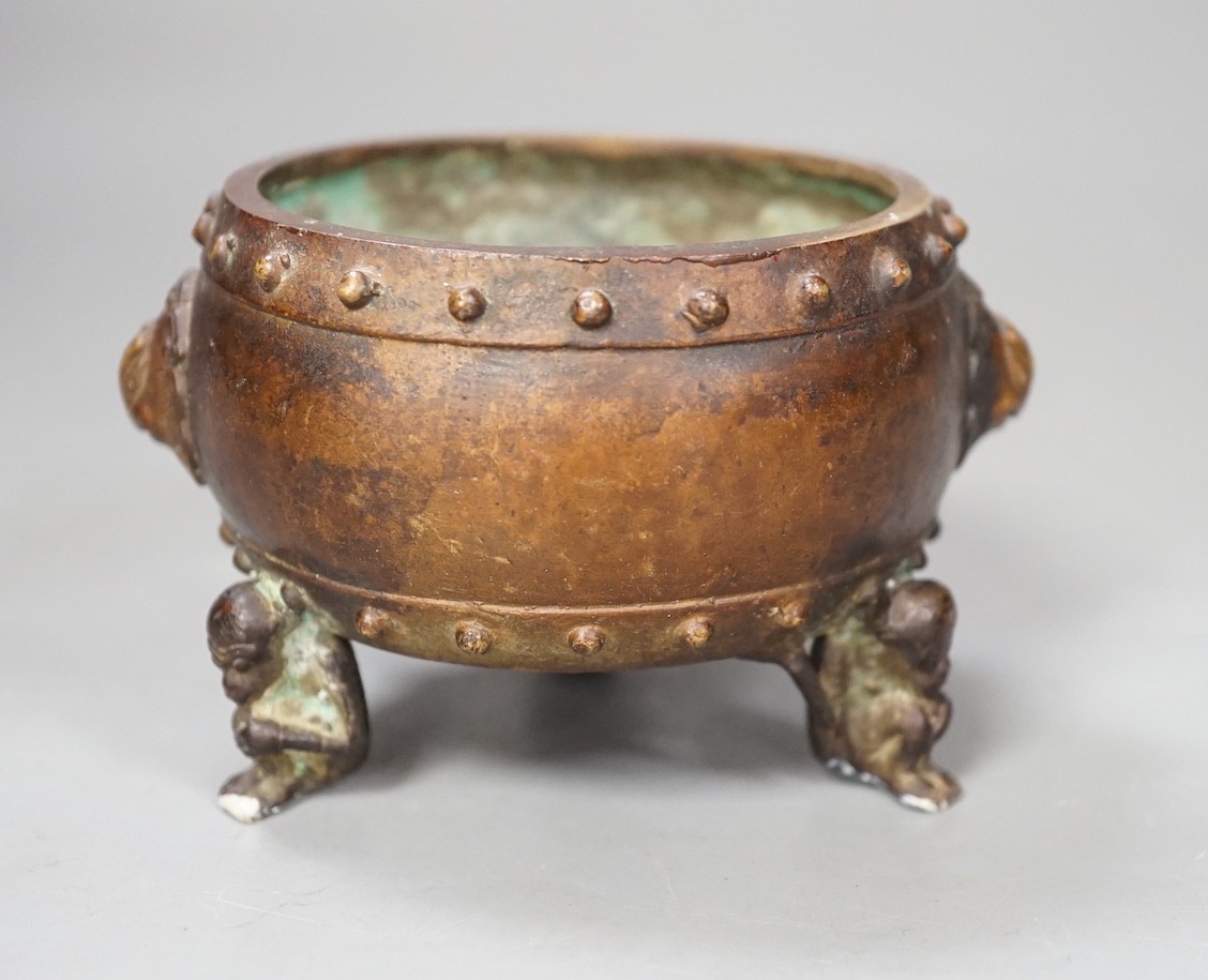 A Chinese bronze tripod censer, Xuande mark - 7cm tall